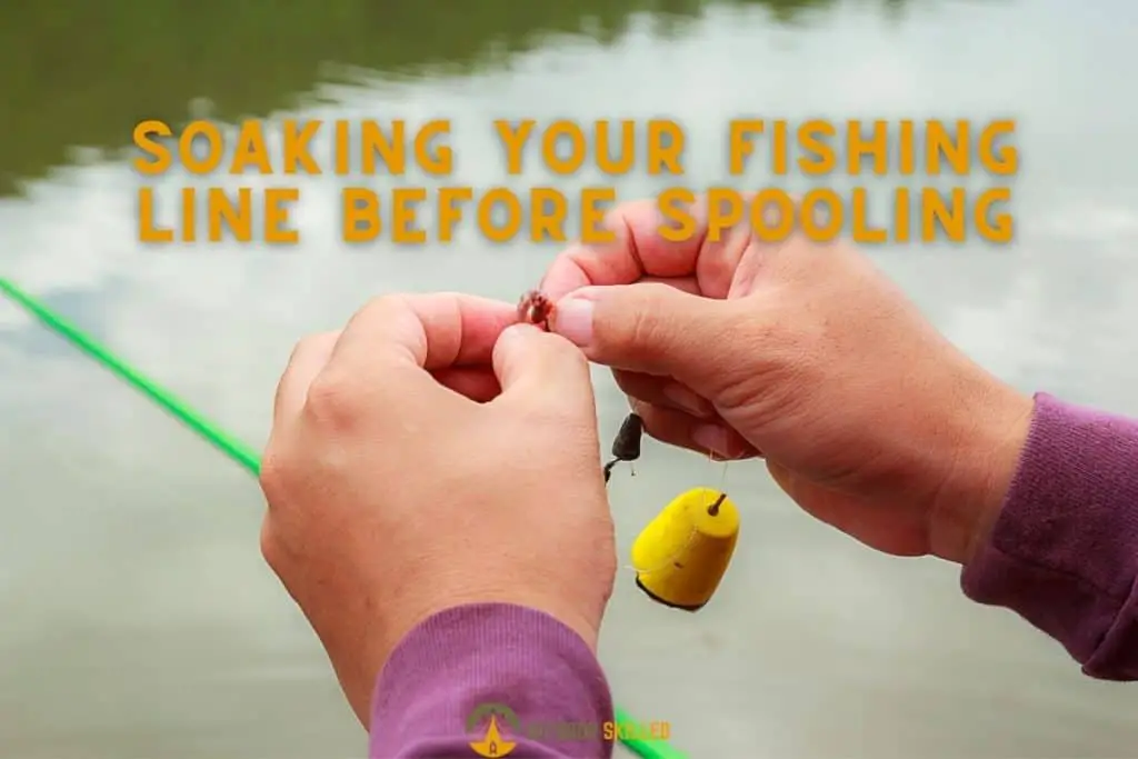 hand holding fishing line to show why you need to soak the fishing line before spooling