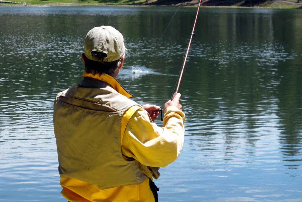 a photo of an angler fishing in the afternoon to show that fish do bite in the afternoon