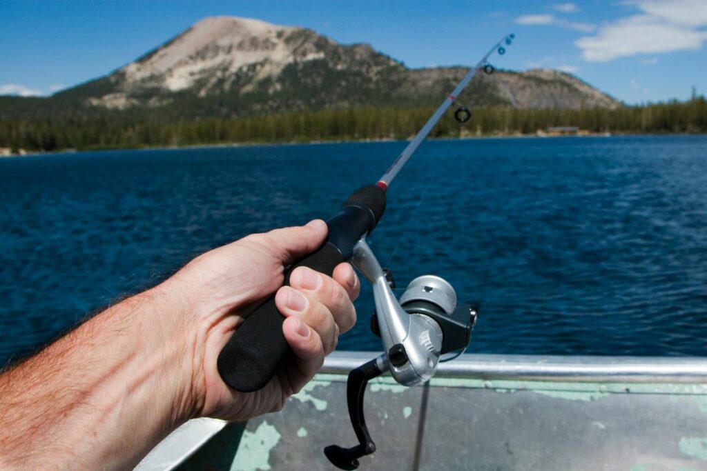 a photo of an angler fishing with fluorocarbon to show why does fluorocarbon catch more fish