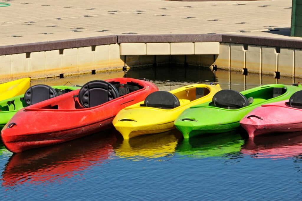 a photo of plastic kayaks to show how long will a plastic kayak last