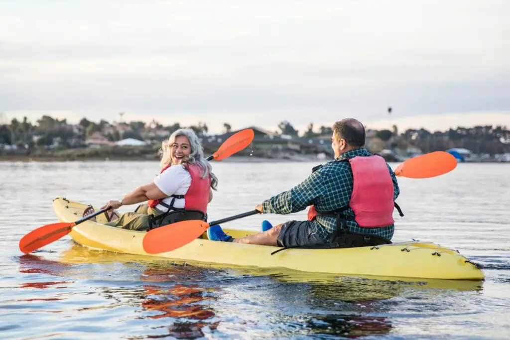 a photo of two plus-sized kayakers to show the best kayaks for big guys